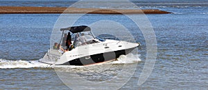 Power Boat at the Estuary of the River Deben Felixstowe Ferry Suffolk