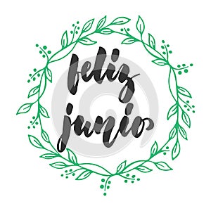 Feliz junio - Happy june in spanish, hand drawn latin summer month lettering quote with seasonal wreath isolated photo