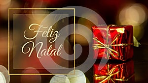Feliz Natal - red Christmas gift on the background of lights, christmas time