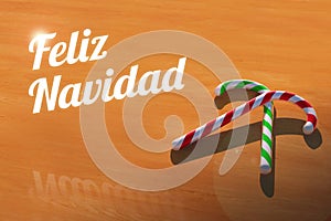 Feliz Navidad with Candy Canes on Wooden Table Greeting Card
