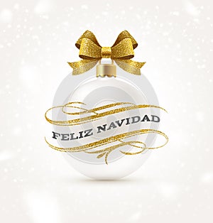 Feliz navidad - Christmas greetings in Spanish with glitter gold flourishes elements and white Christmas bauble