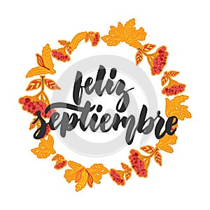 Feliz septiembre - happy september in spanish, hand drawn latin autumn month lettering quote with seasonal wreath photo