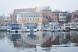 The Fells Point waterfront in fog, in Baltimore, Maryland