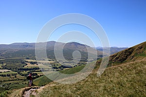 Fellwalker at top Mousthwaite Comb, Scales Fell, UK