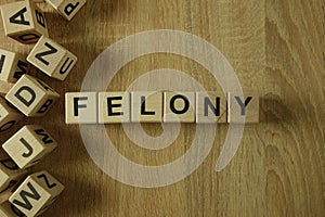Felony word from wooden blocks