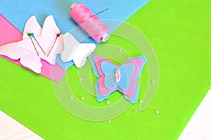 Felt butterfly, paper templates, thread, needle, pins, beads. Sewing kit, tutorial