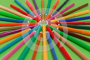 felt pens forming a shape of cirlcle