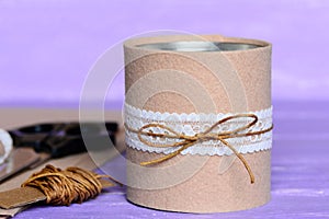 Felt and ribbon recycled tin can. Creative recycling tin cans into holder for office supplies. Thrifty, quick and simple idea