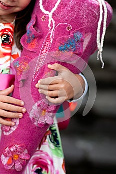 Felted school cone in hands