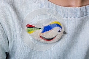 Felted wool brooch in the shape of a bird