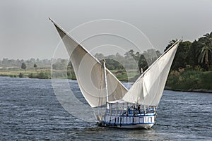 A felucca sails along the River Nile near Esna in central Egypt in the late afternoon.