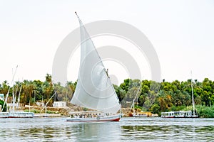 Felucca, traditional wooden sailboat on Nile, Egypt.