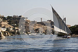 Feluccas - traditional sail vessel on Nile river in Egypt.