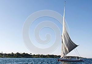 Feluka sailing on Nile river. Egypt