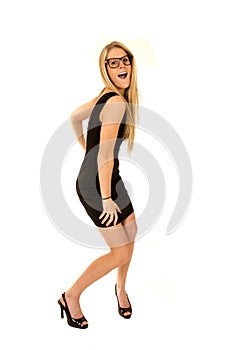 Femaile model in a short black dress high heels an