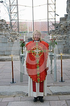 Femal minister in chasuble photo