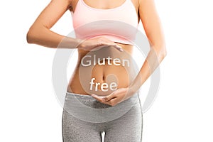 Female abdomen with a GLUTEN FREE text