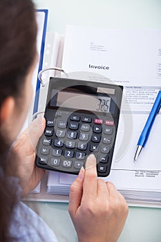 Female Accountant Calculating Bills