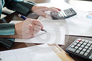 Female accountant checking financial documents