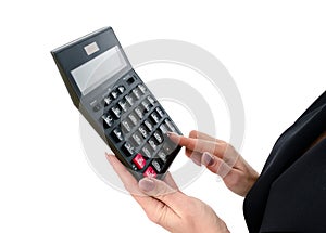 Female accountant clicks on a calculator to calculate tax financial expenses