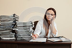 Female accountant manager talking by phone