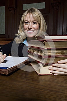 Female Advocate With Law Books