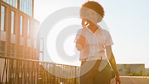 Female African American girl in city business woman talking mobile phone walk on street businesswoman cell communication