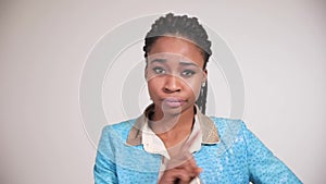 Female afro american person shows disagreement emotions.