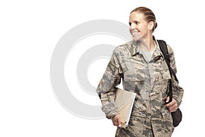 Female airman with books and bag