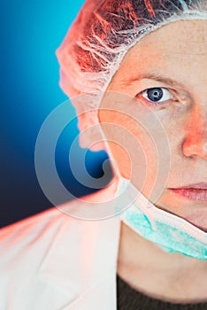 Female allergist immunologist half face portrait photo