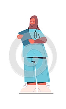 Female arab doctor in uniform holding clipboard healthcare medicine concept