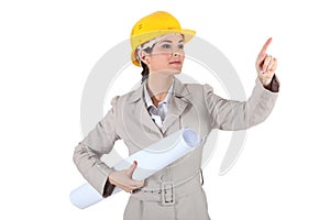 Female architect pointing