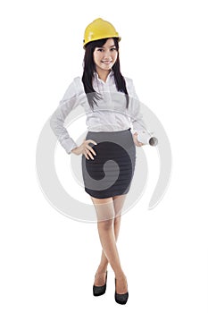 Female architect standing in studio