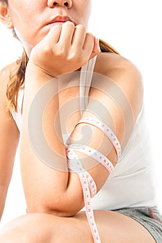 Female arm with tape measure