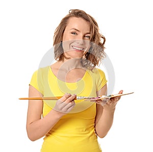 Female artist with brush and paint palette on white background