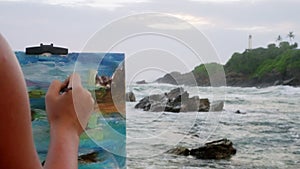 Female artist paints canvas by rocky shore, capturing rough waves, lighthouse backdrop in twilight. Brush in hand, she