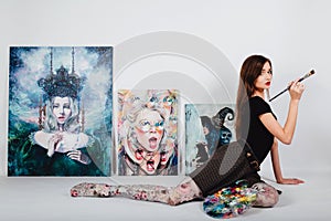 Female artist at Picture canvas on white background. Girl painter with brushes and palette. Art creation concept.