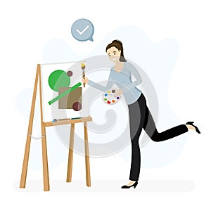 Female artist stands at an easel and draws picture. Funny caucasian, woman painter is holding brush and palette, process of