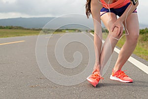 Female athlete ankle injury when running on road