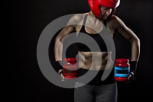 Female athlete with bodybuilding supplements and proteins