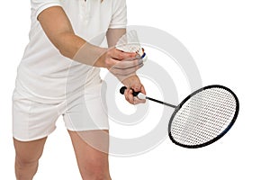 Female athlete holding a badminton racquet ready to serve