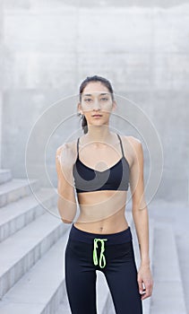 Female athlete with look of courage and determination