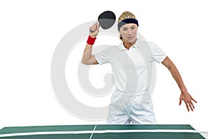 Female athlete playing table tennis