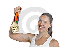Female athlete posing with gold medals after victory