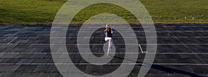 Female athlete preparing legs for cardio workout. Fitness runner doing warm-up routine. woman runner warm up outdoor. athlete