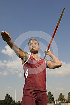 Female Athlete Ready To Throw Javelin