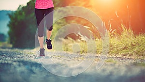 Female athlete runner. closeup on shoes