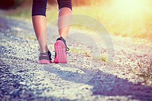 Female athlete runner. closeup on shoes