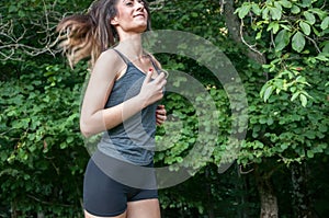 Female athlete running on park