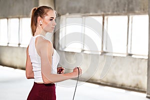 Female Athlete Staying With Rope